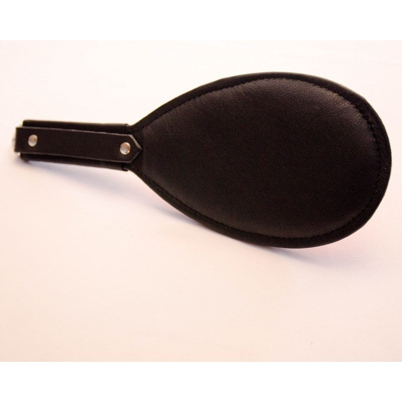 Black round paddle.