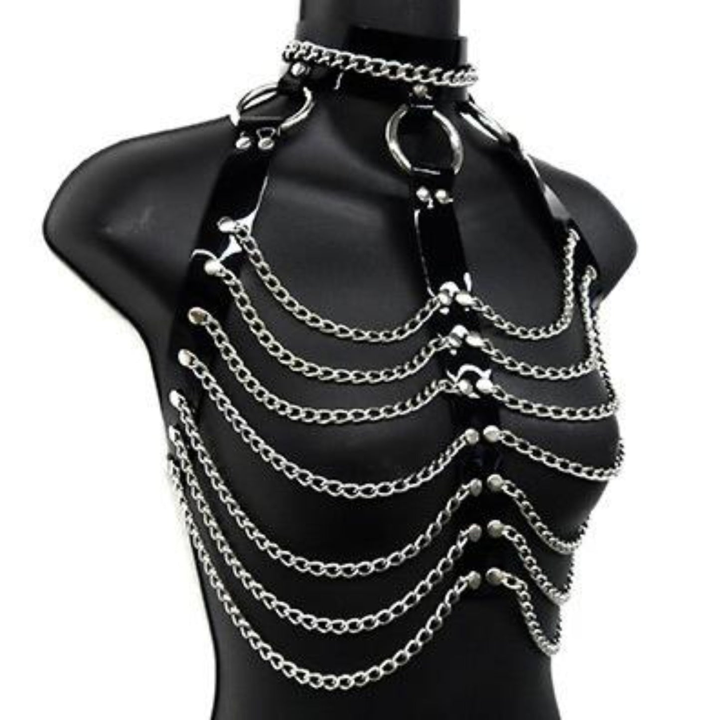 The black patent leather and chain three column halter harness on a mannequin.