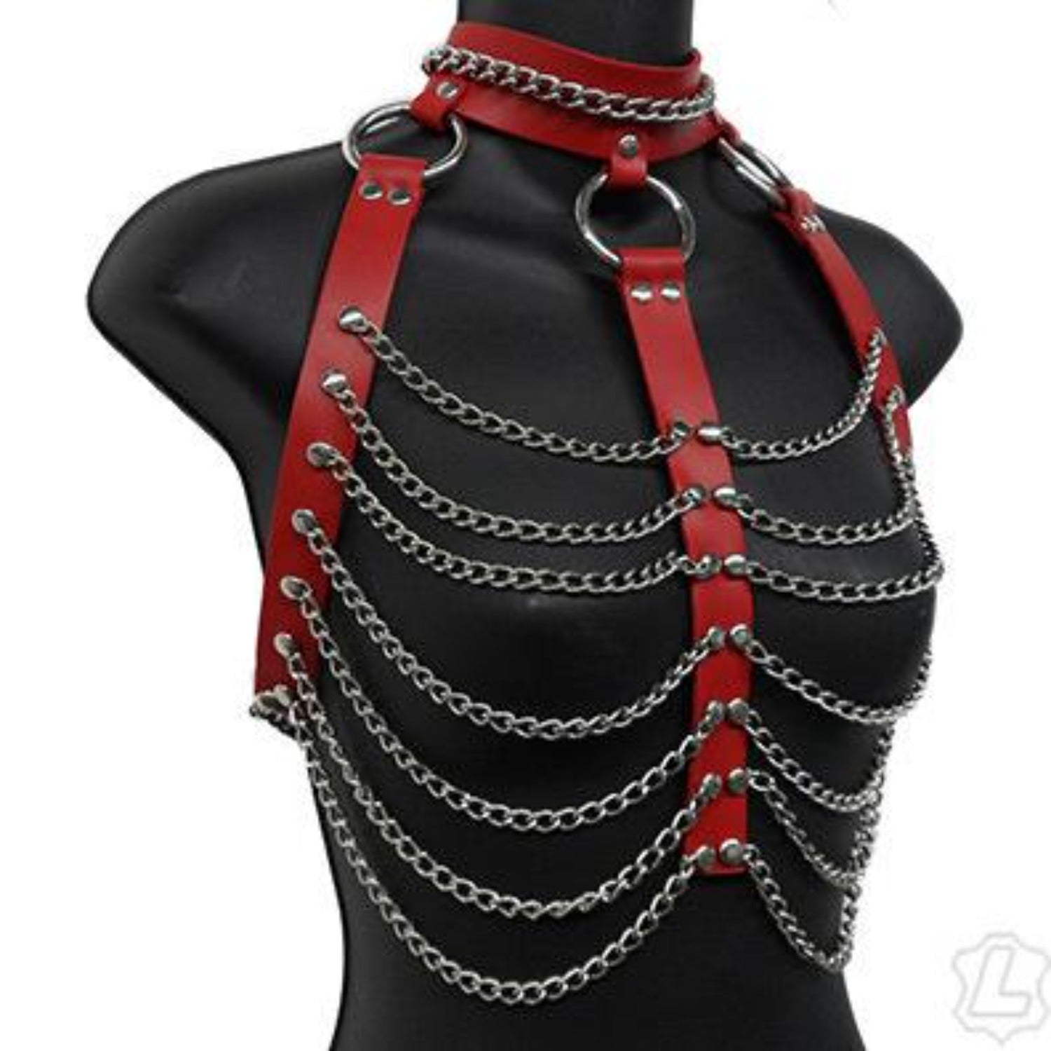 The red leather and chain three column halter harness on a mannequin.