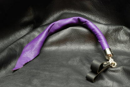 The purple Whiplet Mini Dragontail with sturdy swiveling trigger snap and finger handles.