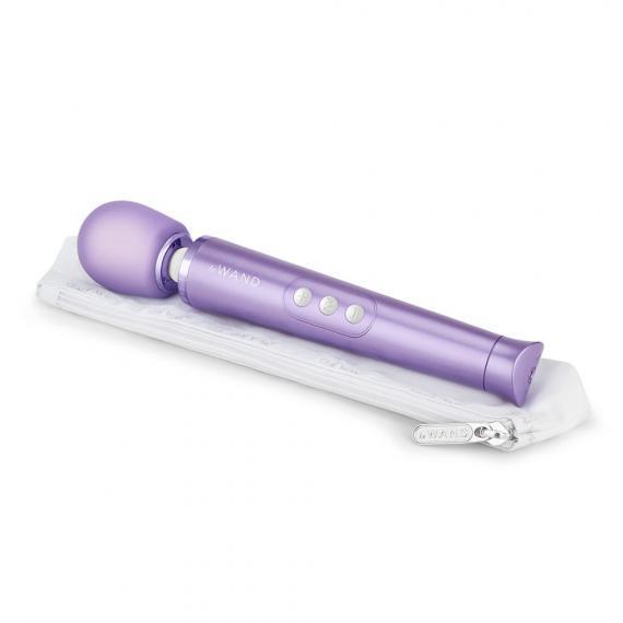 Le Wand Petite Vibrator Violet; lying on its included case