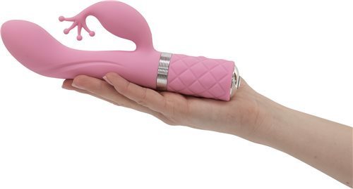 A hand holding the pink Pillow Talk Kinky Dual Action Vibrator.