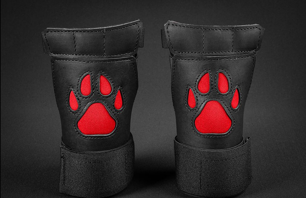 Close up of black/red open paw puppy gloves.