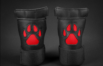 Close up of black/red open paw puppy gloves.