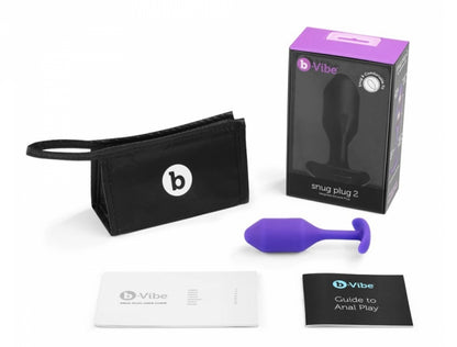 B-Vibe Vibrating Weighted Anal Snug Plug with case with included Guide To Anal Play.