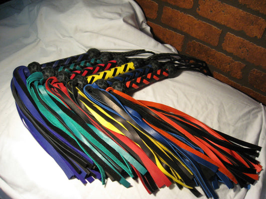 Six Deertan cowhide Floggers in various colors.
