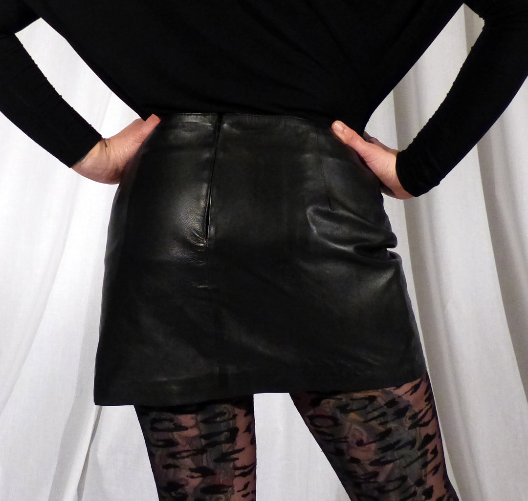 Model showing the back of the Leather Side Lace Skirt.