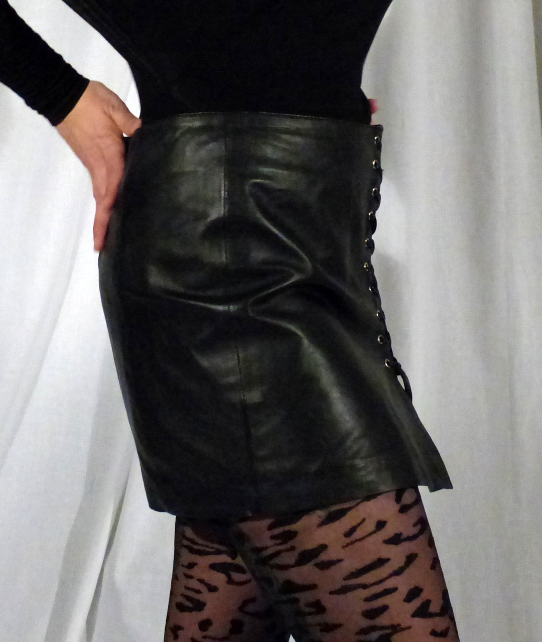 Model showing the right side of the Leather Side Lace Skirt.