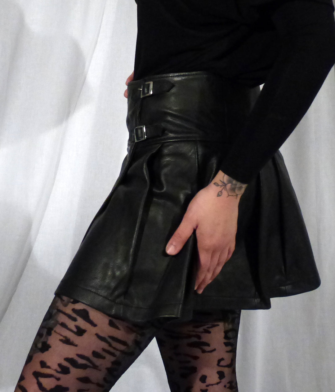Leather Kilt Skirt on model, left side view.