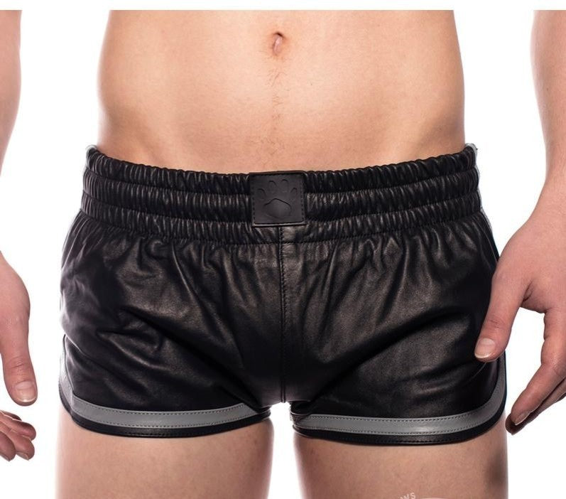 Close up of the front of the black and grey prowler leather sport shorts.