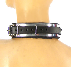 A rear view of the Lined Metal Band Bondage Collar with buckle on a mannequin.
