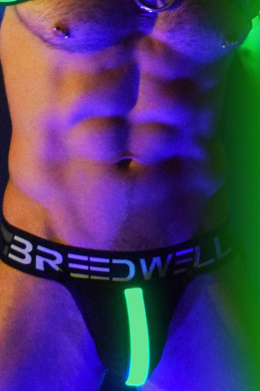 The green Glow Pouch on a model.