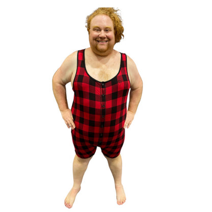 Model wearing plaid bamboo tank onesie, hand on hips, front view.