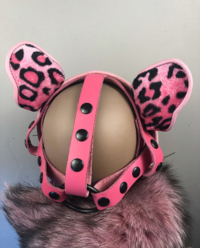 Pink Leather Big Cat mask on mannequin head with a pink and black fur scarf, rear view.