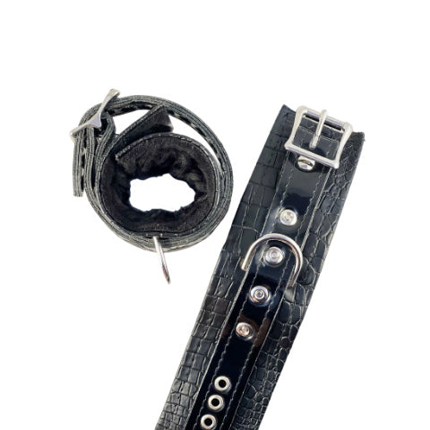 black quality vegan leatherette cuff open buckle rivets along black center strap
