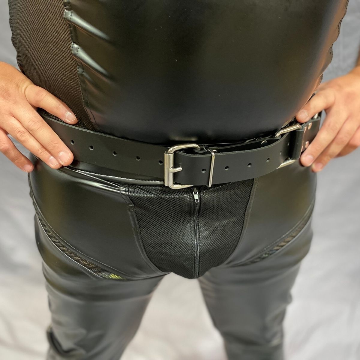 The front of bondage trick belt on a model.