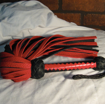 A red and black buffalo flogger.