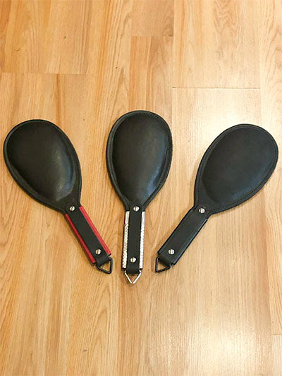 An assortment of round paddles.