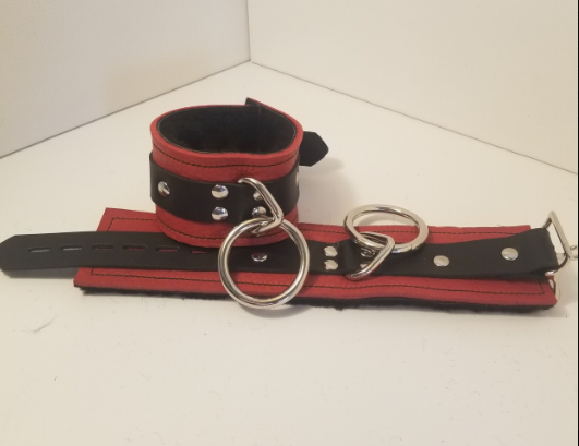 Pair of red Basic Fleece Wrist Restraint Cuffs.