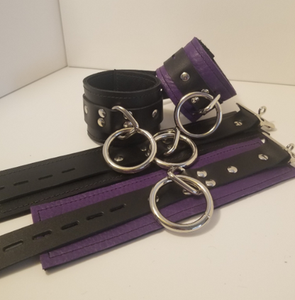 Pair of purple Basic Wrist Restraint Cuffs and a pair of black Basic Ankle Restraint Cuffs.