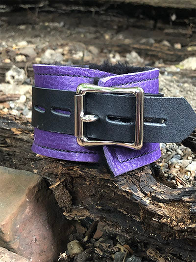 Back closure of purple basic fleece wrist restraint cuff