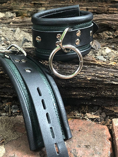 Hunter Green rolled leather deluxe cuffs, one buckled the other extended out