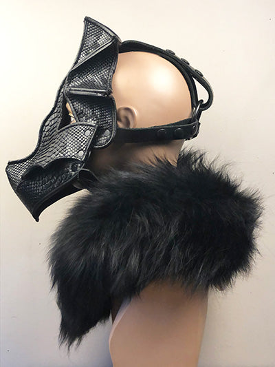 left facing black leather dragon mask on mannequin