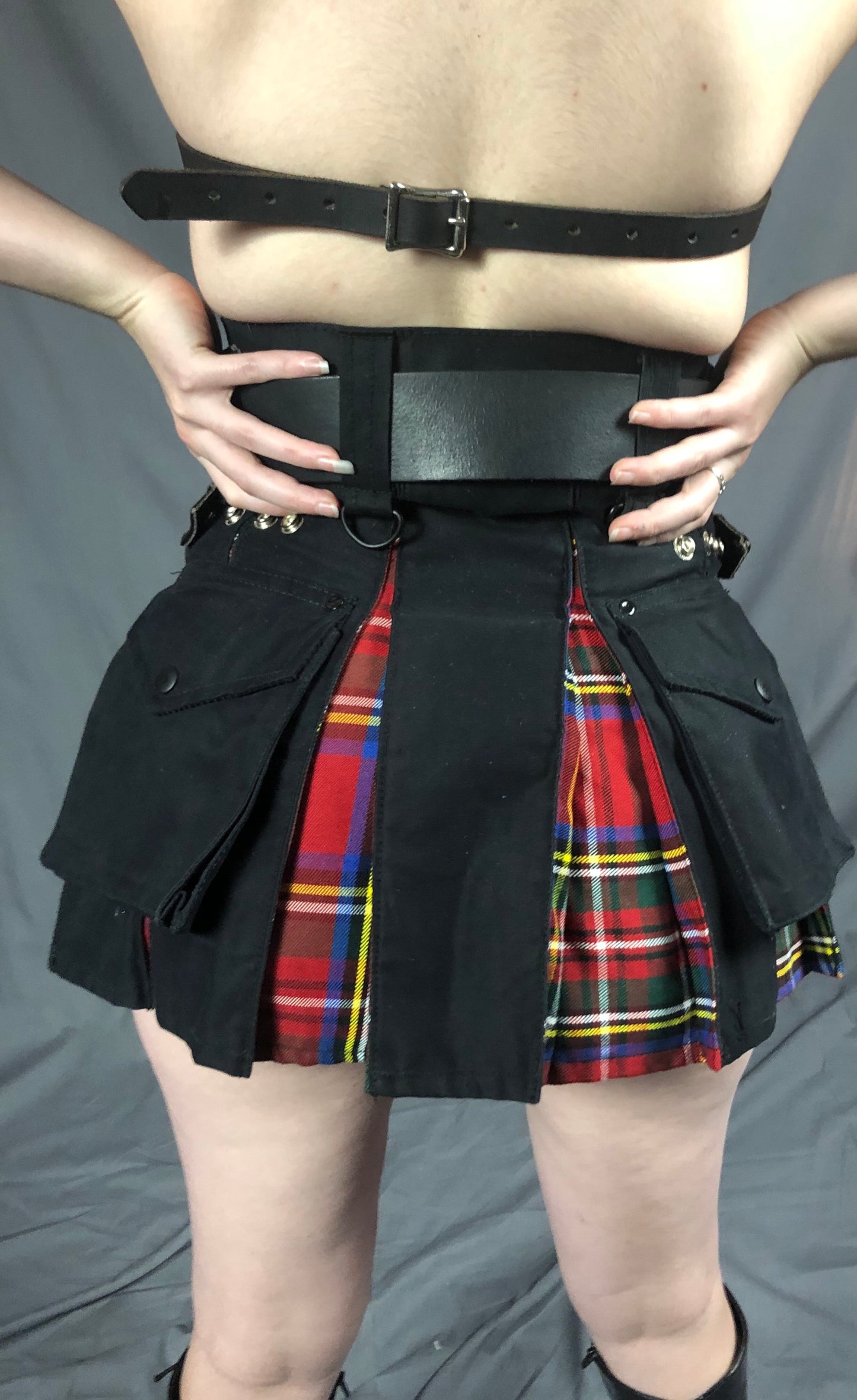 The back of the Black and red tartan Mini Contrast Pleat Cargo Kilt.