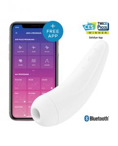 The white Satisfyer Curvy 2+ next to a phone featuring the accompanying app.
