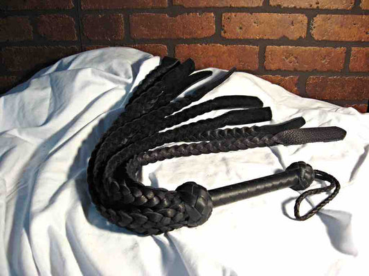 The black Flat Braid Flogger with Flat Riveted Tips.