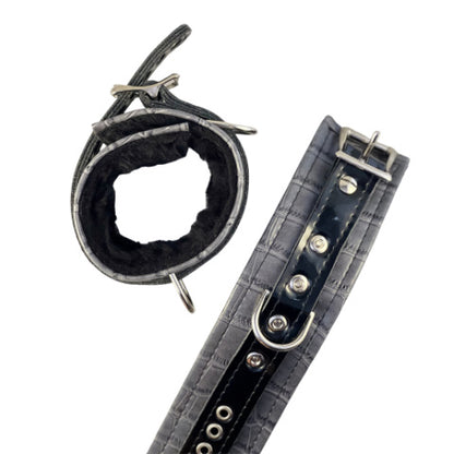 grey quality vegan leatherette cuff open buckle closure rivets along center black strap