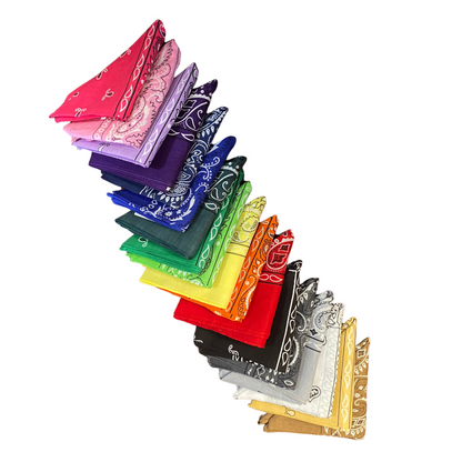 A row of hankies folded into neat triangles, layered next to each other. The colors span the whole rainbow and more.