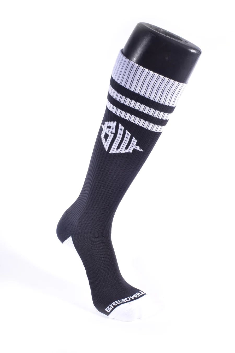 The black Hex Socks on a mannequin leg.