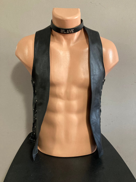 A mannequin showing the front of the vest. There is no closure to the vest, there are laces on both sides.