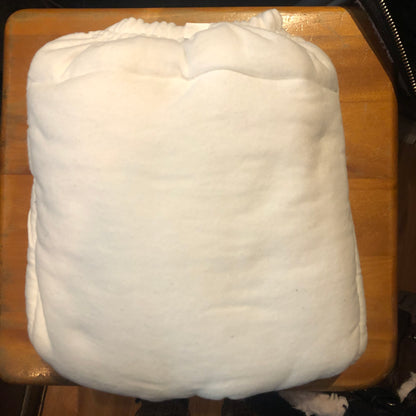 The White Cloth Diaper with Velcro Closure.