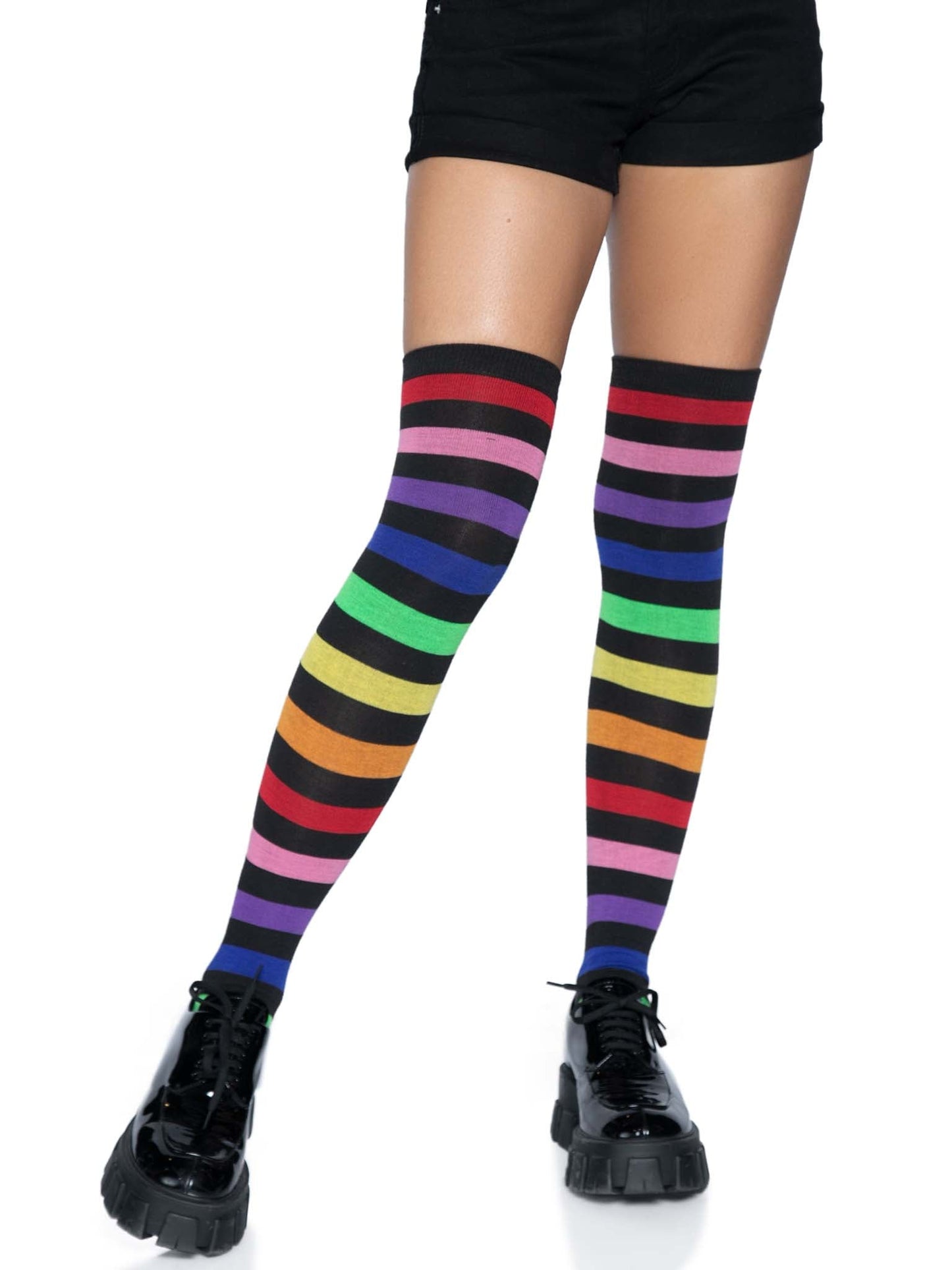 Aurora Rainbow Over The Knee Rainbow Socks on model wearing black shoes and shorts, front view.