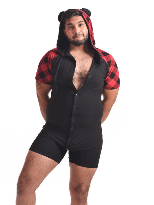 A model showing the front of the red with black Bear Plaid Bamboo Onesie with hoodie up and some of the buttons unsnapped.