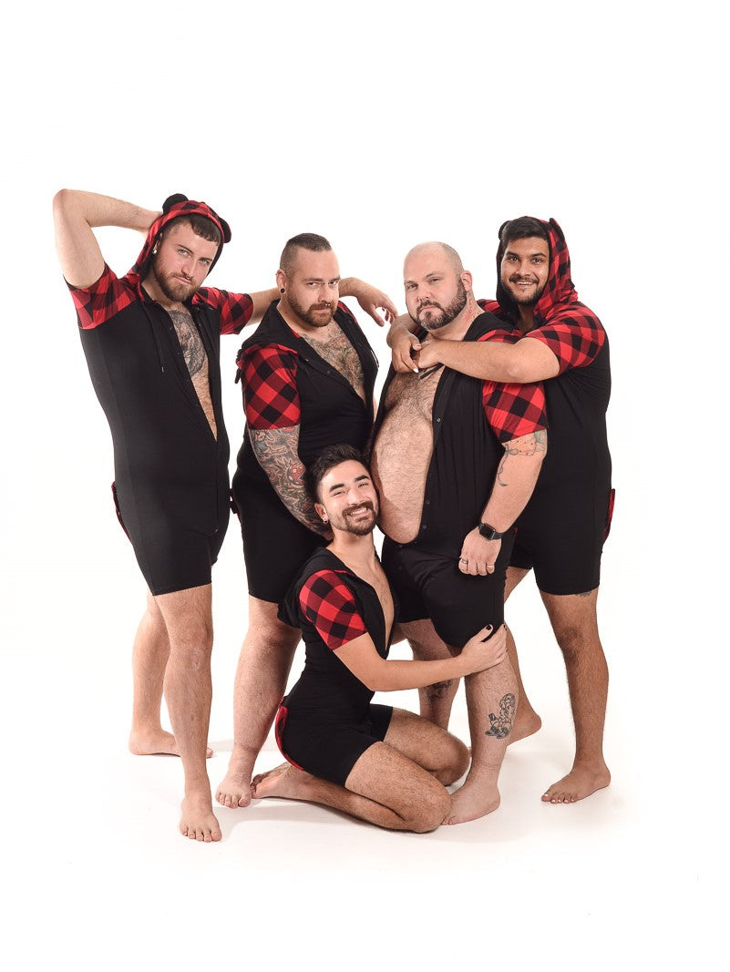 A group of models all wearing the Bear Plaid Bamboo Onesie.