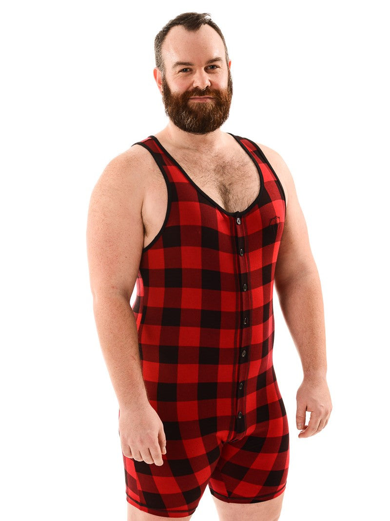 Model wearing plaid bamboo tank onesie, front view.