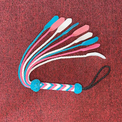 Limited Edition Trans Pride Flag Medusa Flogger on carpet with falls spread.