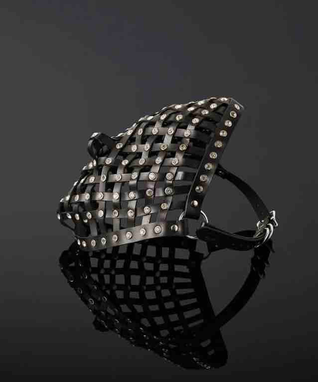 The left side view of the Opulanta Obscura Luxury Leather Strapped Mask.