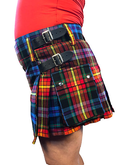View of the 2 side buckle closures and pocket on the left side of the mini faux wool tartan cargo kilt.