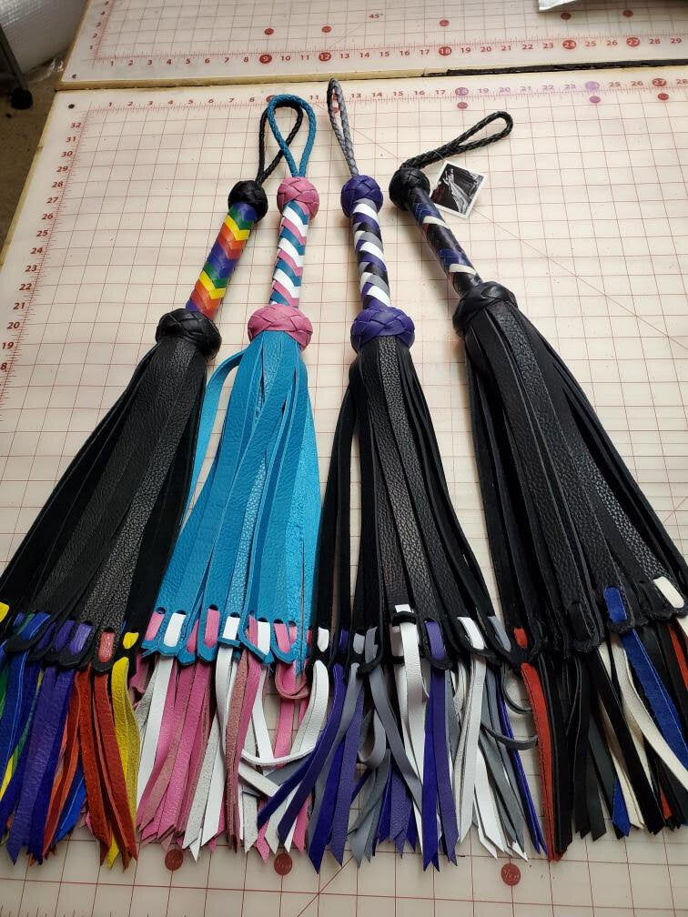 Four Medusa floggers with Pride Flag Color Combinations.