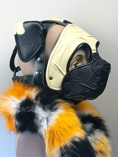 facing to the right pug leather pup mask on mannequin