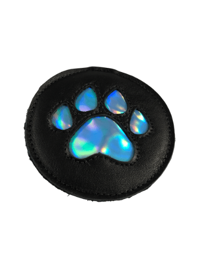 The black leather pup paw medallion with metallic light blue paw design.