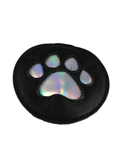 The black leather pup paw medallion with metallic silver paw design.