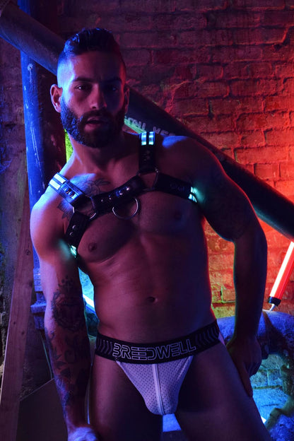 A model wearing the Rave Bulldog Harness lit up in white.
