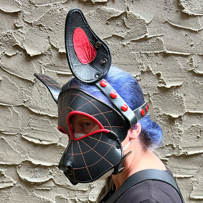 Left side of model wearing Spider Leather Pup Mask