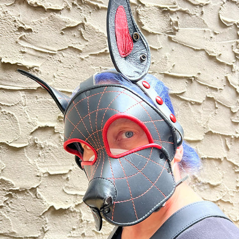 Left front side of model wearing Spider Leather Pup Mask