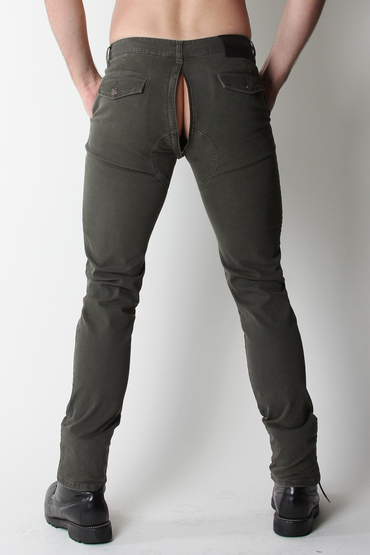 Model showing the rear of the Titan Zip Back Pants with the back zipper unzipped. 